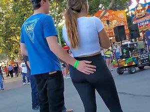 Boyfriend keeps a hand on hot girlfriend all the time