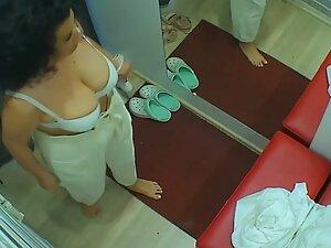 Spying on seductive milf with big boobs in dressing room Picture 7