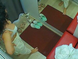 Spying on seductive milf with big boobs in dressing room Picture 8