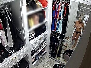 Spying on her tattoo and big boobs while she gets dressed Picture 5