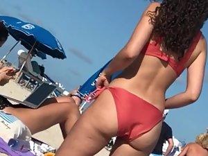Stunning beach girl in sexy red bikini Picture 7
