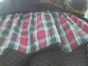 Wind uncovers her fishnet stockings Picture 3