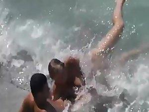 Spying a fun fuck in the wavy water Picture 1