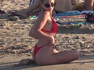 Hottie in red bikini caught while posing for sexy photos