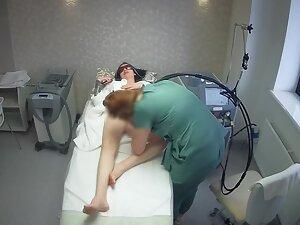 Sexy tattooed girl keeps texting during hair removal treatment Picture 3