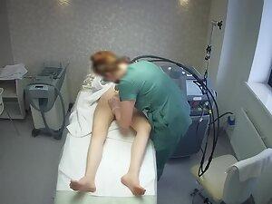 Sexy tattooed girl keeps texting during hair removal treatment Picture 4