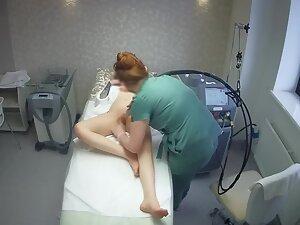 Sexy tattooed girl keeps texting during hair removal treatment Picture 5
