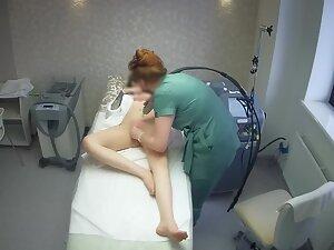 Sexy tattooed girl keeps texting during hair removal treatment Picture 6