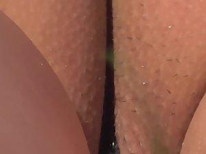 Hairy pussy slip out of thong during suntanning Picture 5