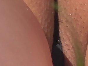 Hairy pussy slip out of thong during suntanning Picture 6