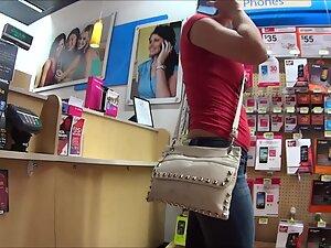 Crouching makes her ass crack peek out of jeans Picture 2