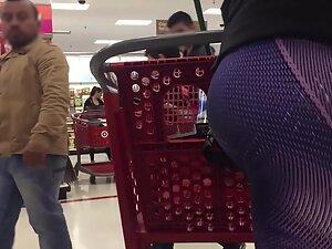 Checking out her fit ass while she shops in store Picture 5