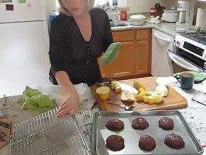 Mature lady spied while baking muffins Picture 4