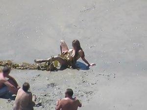 Wacky nudist woman rolls in the mud Picture 6