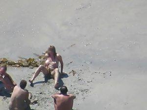 Wacky nudist woman rolls in the mud Picture 7