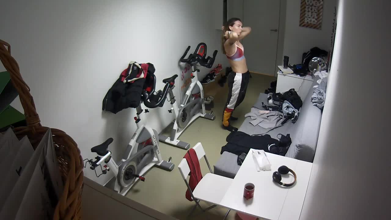 Spying on sporty girl preparing for a workout