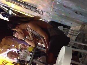 Sideboobs and hard nipples of braless girl during night out Picture 3