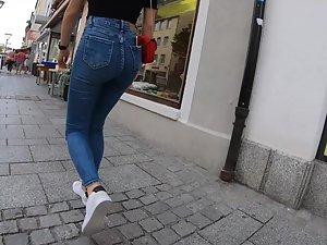 Curly girl looks sexy in tight jeans Picture 3