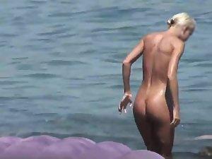 Skinny girl's big pussy bulge on a beach Picture 5