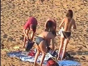 Nudist family leaving the beach Picture 3