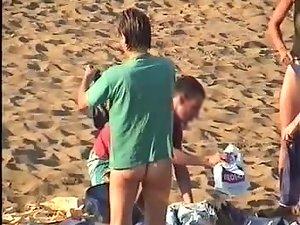 Nudist family leaving the beach Picture 5