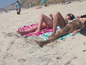 Sexy nudist friends caught while sunbathing on beach