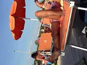 Milf lying by the pool and touching pussy Picture 2
