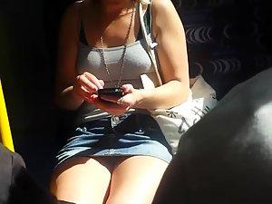 Upskirt sights of a girl texting in the bus Picture 8