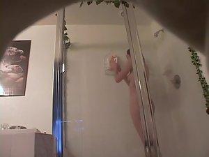 Smooth teen girl under the shower Picture 2
