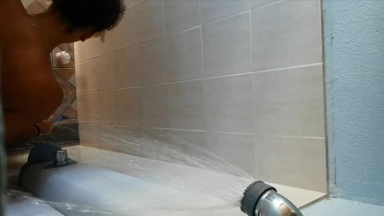 Peeping on nude black girl in the shower