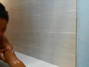 Peeping on nude black girl in the shower Picture 3