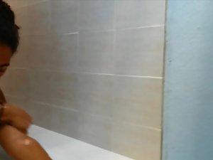 Peeping on nude black girl in the shower Picture 5