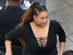 Massive boobs of a big girl seen from above