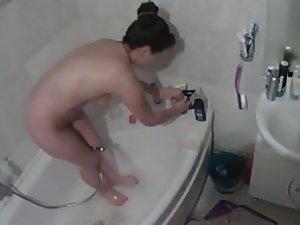 Spying on sister enjoying a bubble bath Picture 1