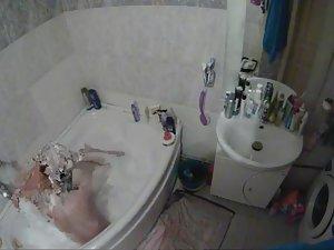 Spying on sister enjoying a bubble bath Picture 2