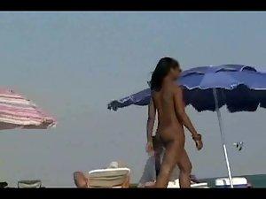 Black girl nude on a beach Picture 3