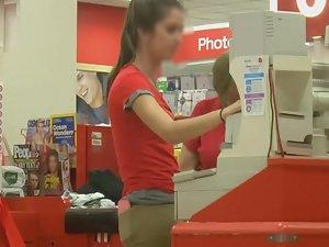 Sexy cashier girl at work