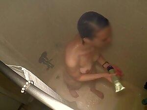 Spying on slim woman in shower from above Picture 2