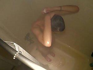 Spying on slim woman in shower from above Picture 3