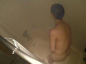 Spying on slim woman in shower from above Picture 8