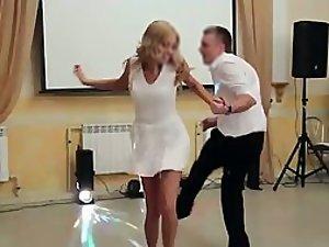 Peeking up her skirt during a dance Picture 1