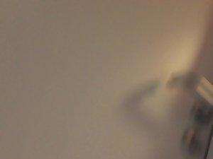Quick peep to see wet asian bush in shower Picture 1