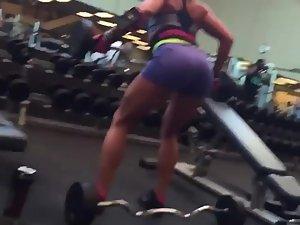 Muscular woman's ass in the gym Picture 7
