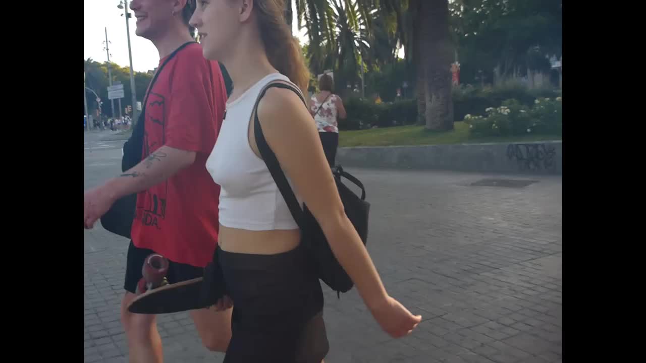 Skater girls tits poking through her white