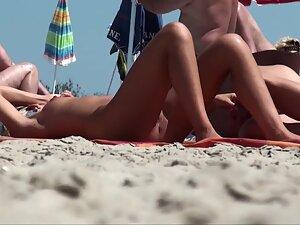 Nudist couple uses beach for foreplay Picture 1