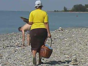 Teen girls playing on a nude beach Picture 8