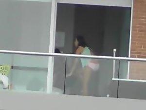 Teen girl snaps dirty selfies on balcony Picture 1