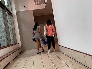 Tight grey outfit makes her look sexy in the mall Picture 6