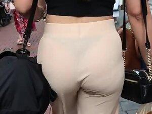 Bubble butt and thong in transparent beige pants