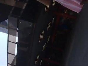 Voyeur peeps on appealing girl's skirt Picture 3